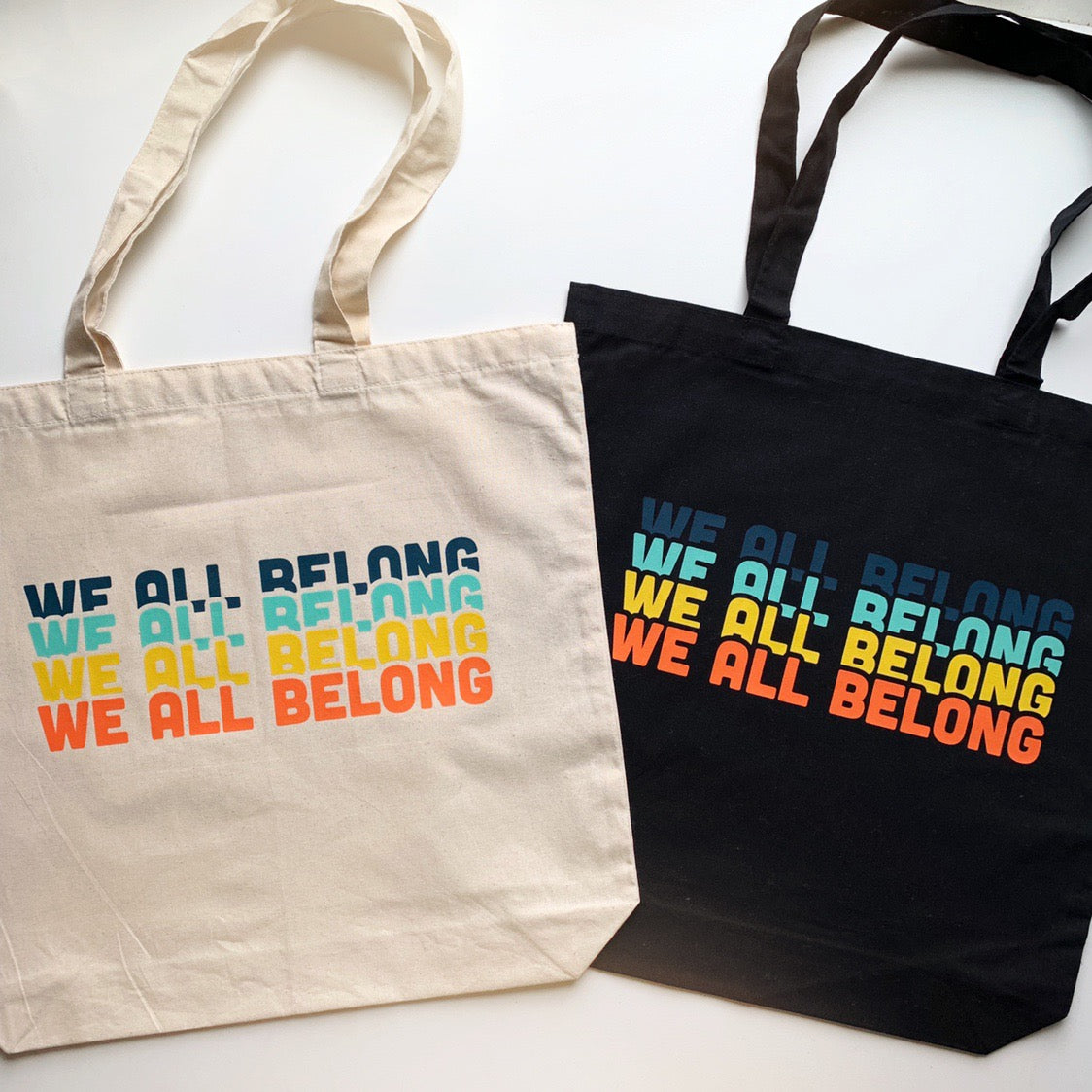 We All Belong Tote Bag